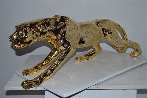 versace jaguar statue gold price|is Versace real gold.